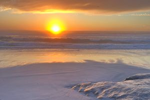 The sun setting over the Pacific Ocean