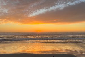 The sun setting over the Pacific Ocean