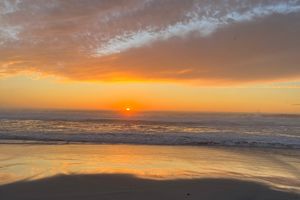 The sun setting over the Pacific Ocean